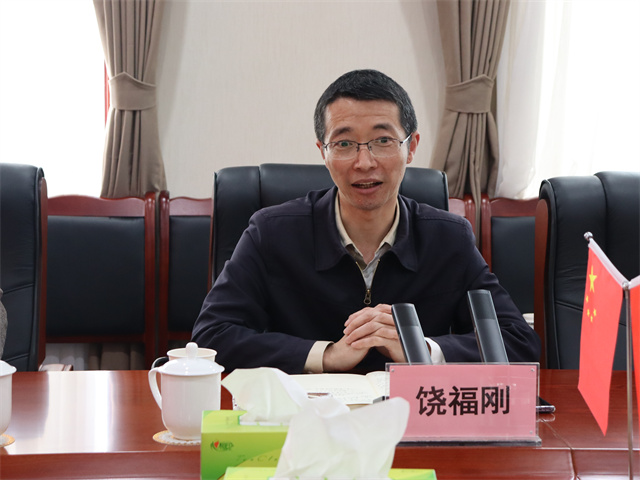 鄧華會見宜賓市供銷社黨委書記、理事會主任饒福剛一行